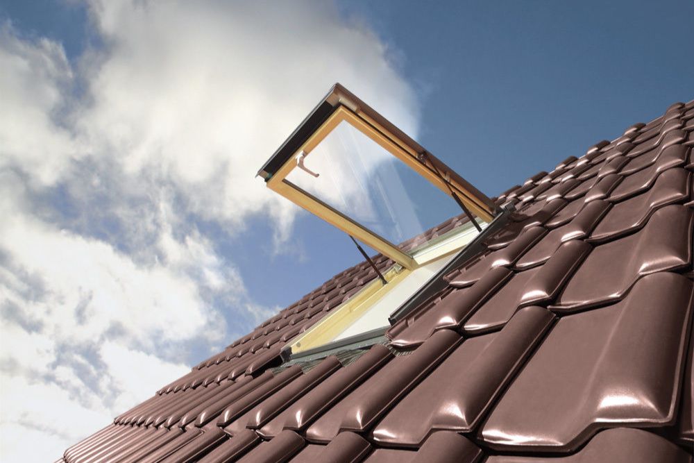 A roof equipped with a skylight and a window, representing our skylight installation offerings in Reno, NV.