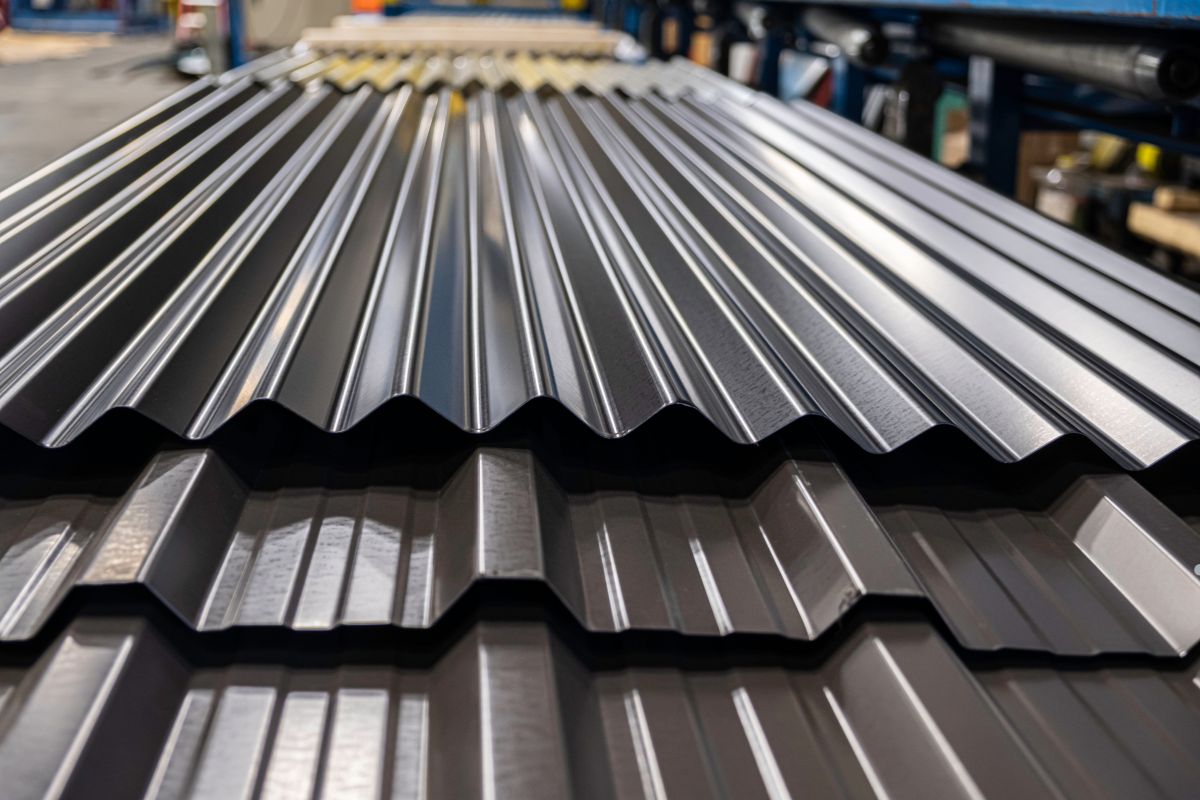 Close-up of a metal roofing sheet, showcasing its texture and finish, relevant to roofing service applications.